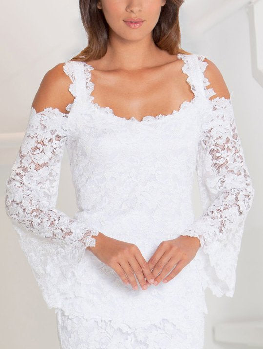 White lace blouse with long sleeves on a plain background