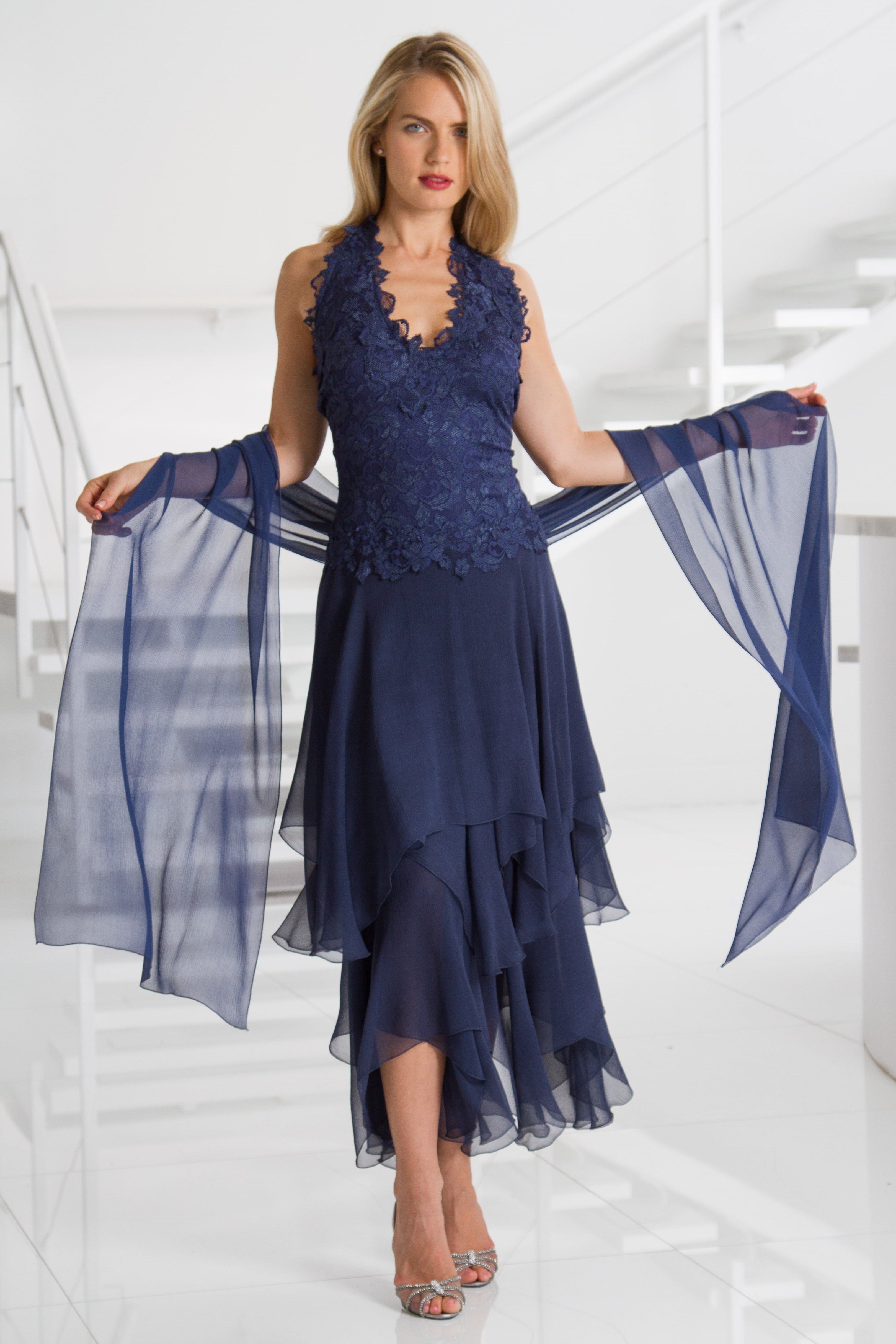 Woman wearing a Lace Halter Bodice Dress with Hanky Hem and Stole on a white background