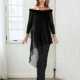 Woman wearing a black off-shoulder top and black sequin skirt in a room with white walls.