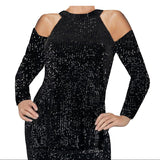A black sequin halter neck top with cold shoulder detailing.